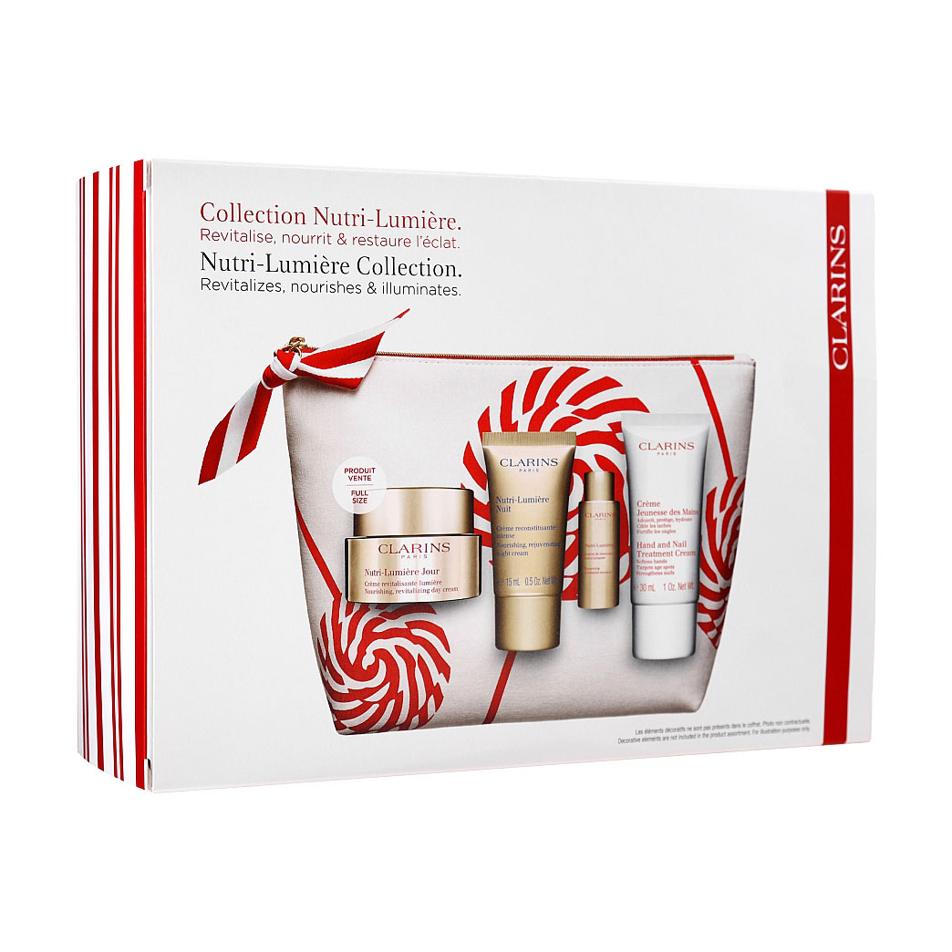 

Набір для обличчя Clarins Nutri-Lumiere Collectiоn (денний крем, 50 мл + нічний крем, 15 мл + лосьйон, 10 мл + крем для рук, 30 мл + косметичка)